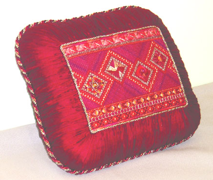 The Red Pillow -- the "Kilimanjaro" pattern stitched in the "Congo" colorway